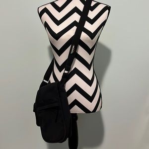 Black Kavu crossbody bag.